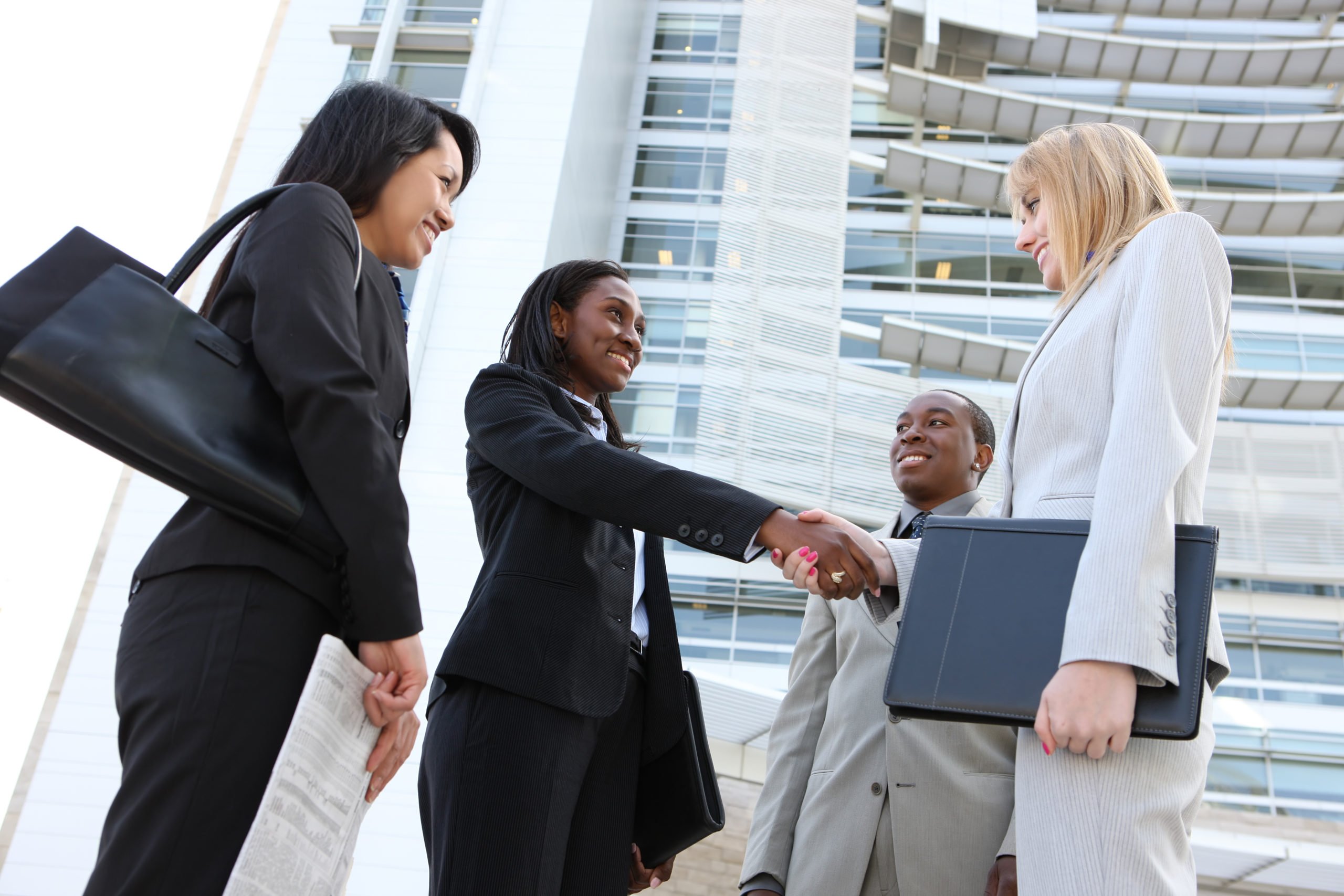 Diverse Business Team Handshake Contact CyberArk Ventures Team