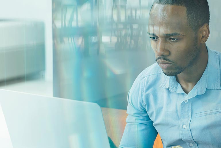 Man looking at laptop