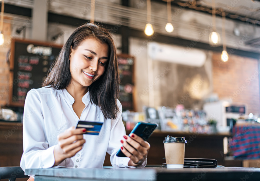 Pay for goods by credit card through a smartphone in a coffee shop