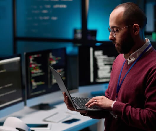 woman looking at phone in car