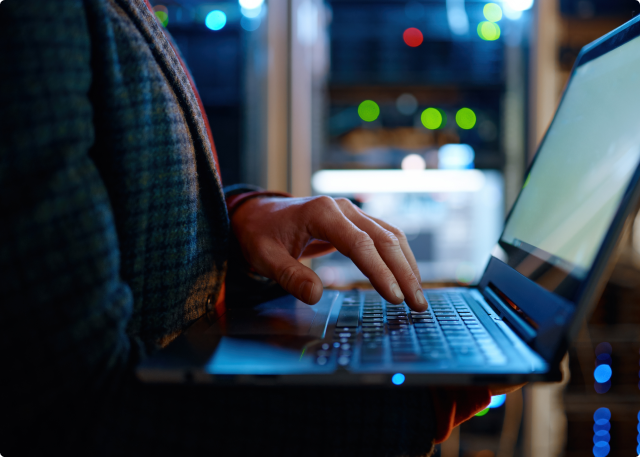 hand on laptop