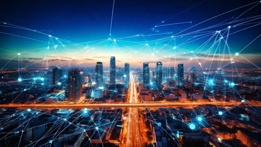 Feature image: A futuristic cityscape with a prominent AI network overlay, showing interconnected nodes and pathways, symbolizing the integration of AI in modern infrastructure.