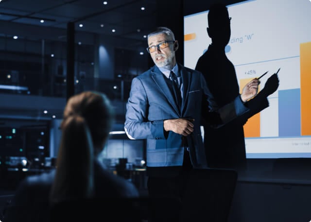 man-presenting-chart-640x457 man-presenting-chart