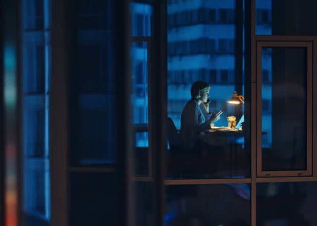 person-in-office-at-night Person in Office at Night