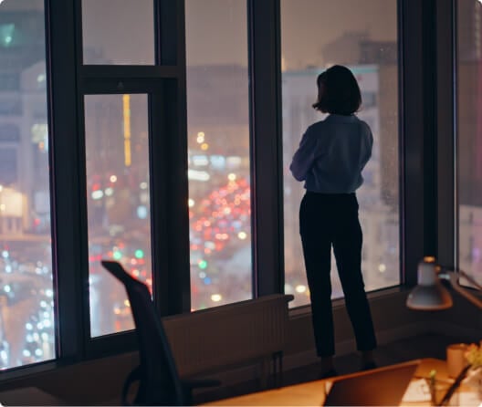 woman overlooking busy city