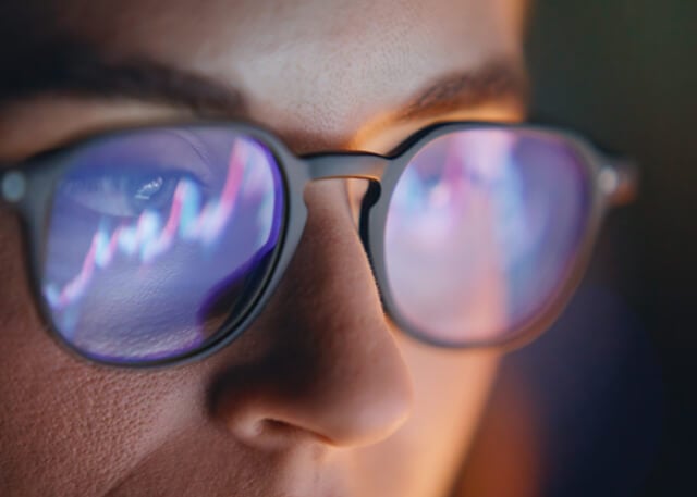 woman uplcose wearing glasses