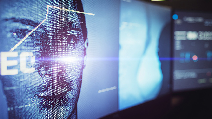 Abstract digital face on a screen with data patterns and lens flare, representing AI agents and blurred identity boundaries.